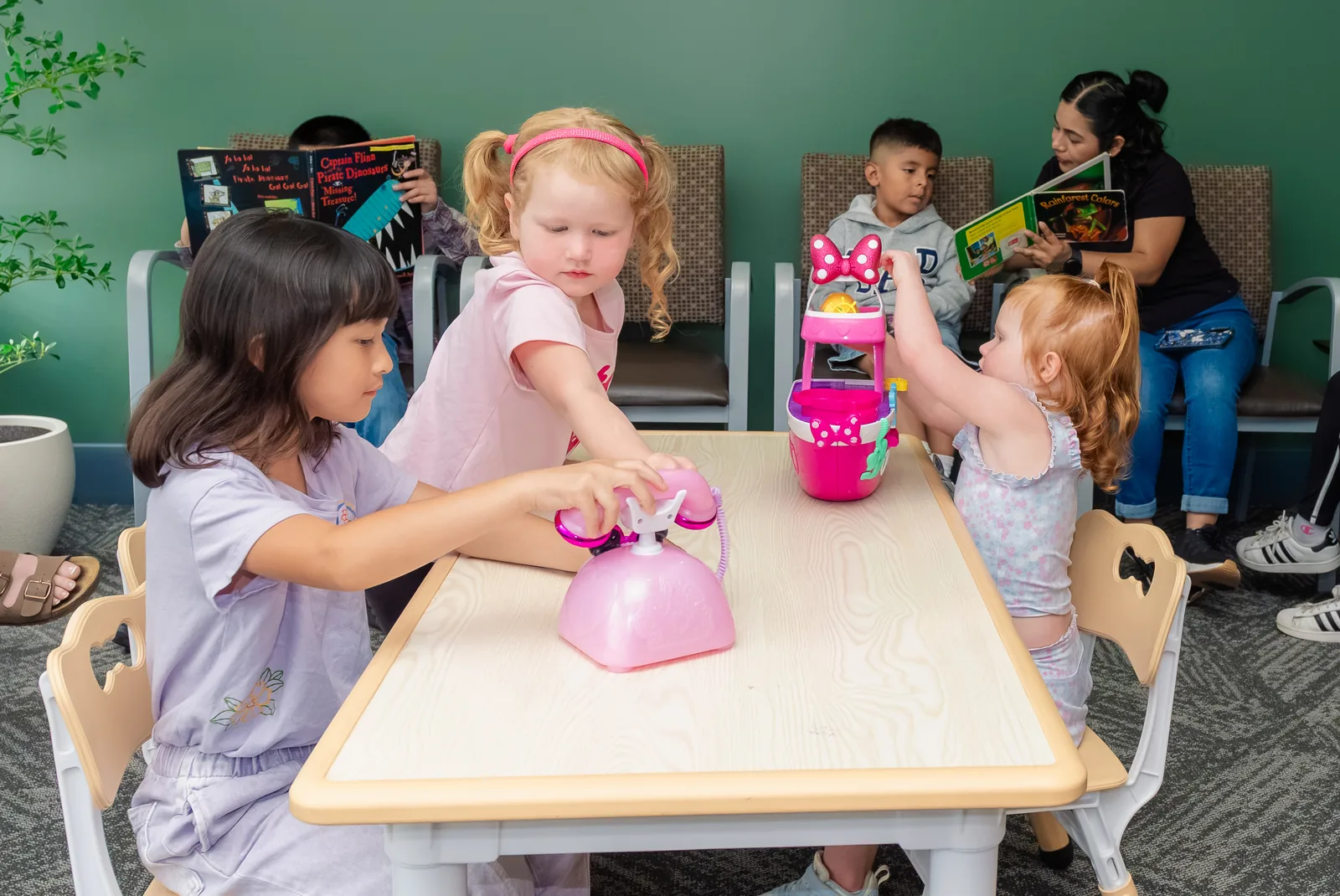Children playing in the remodeled lobby at Pleasant Valley Pediatric Dentistry