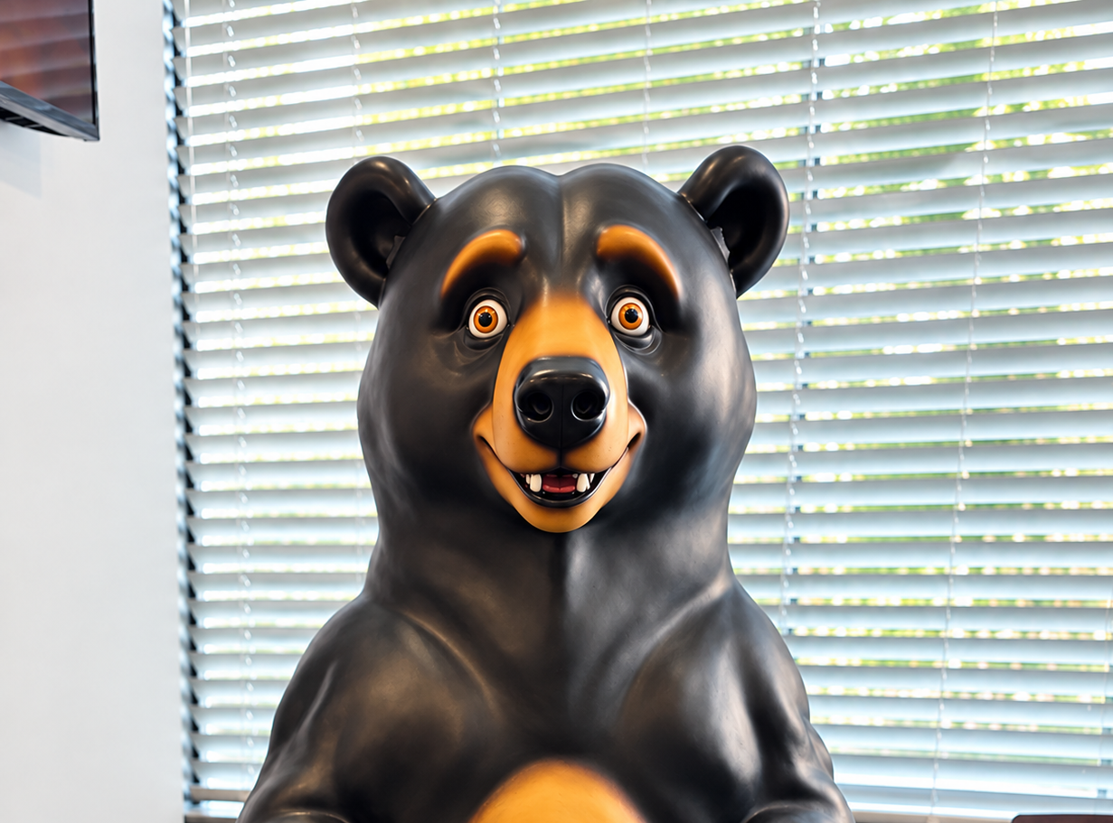Patty, the big black bear mascot, in the lobby at Pleasant Valley Pediatric Dentistry